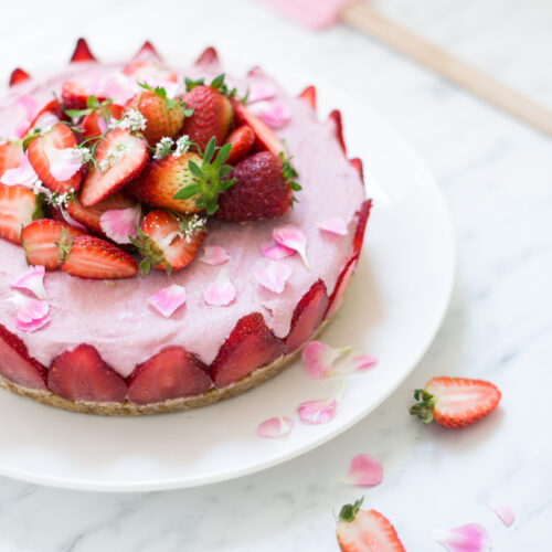 Vegan strawberry cheesecake with fresh ingredients, coconut oil, cashew nuts and strawberries